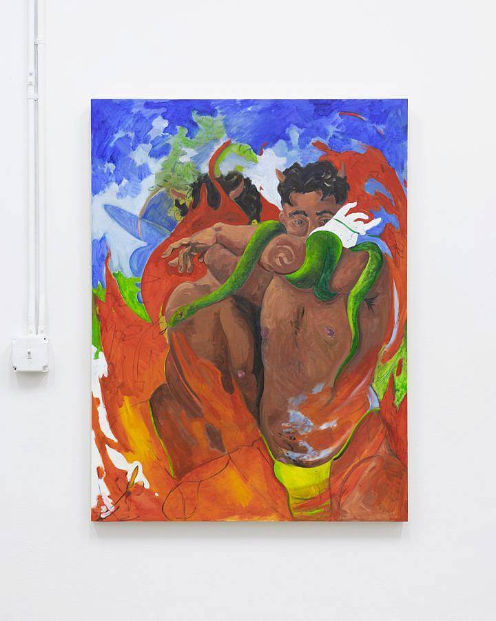 Image description: The work featured in titled: "Spit Fire In The World So Cold" from 2020. The painting is oil on wooden panel and measures 48”x36” . The painting features a horned human figure wearing yellow underwear that is covering their face with their arms. A green snake is gripping their arm and the figure is surrounded by fire.