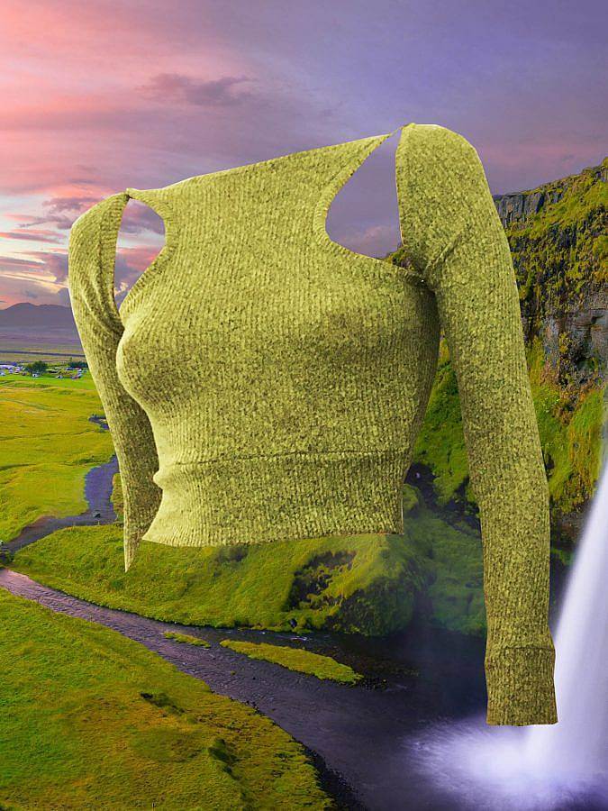 Image Description: This is a photograph of a MODU top in light green. The shirt is made of a tank top with long sleeves snapped on. The background is a lush green landscape with a setting sun.