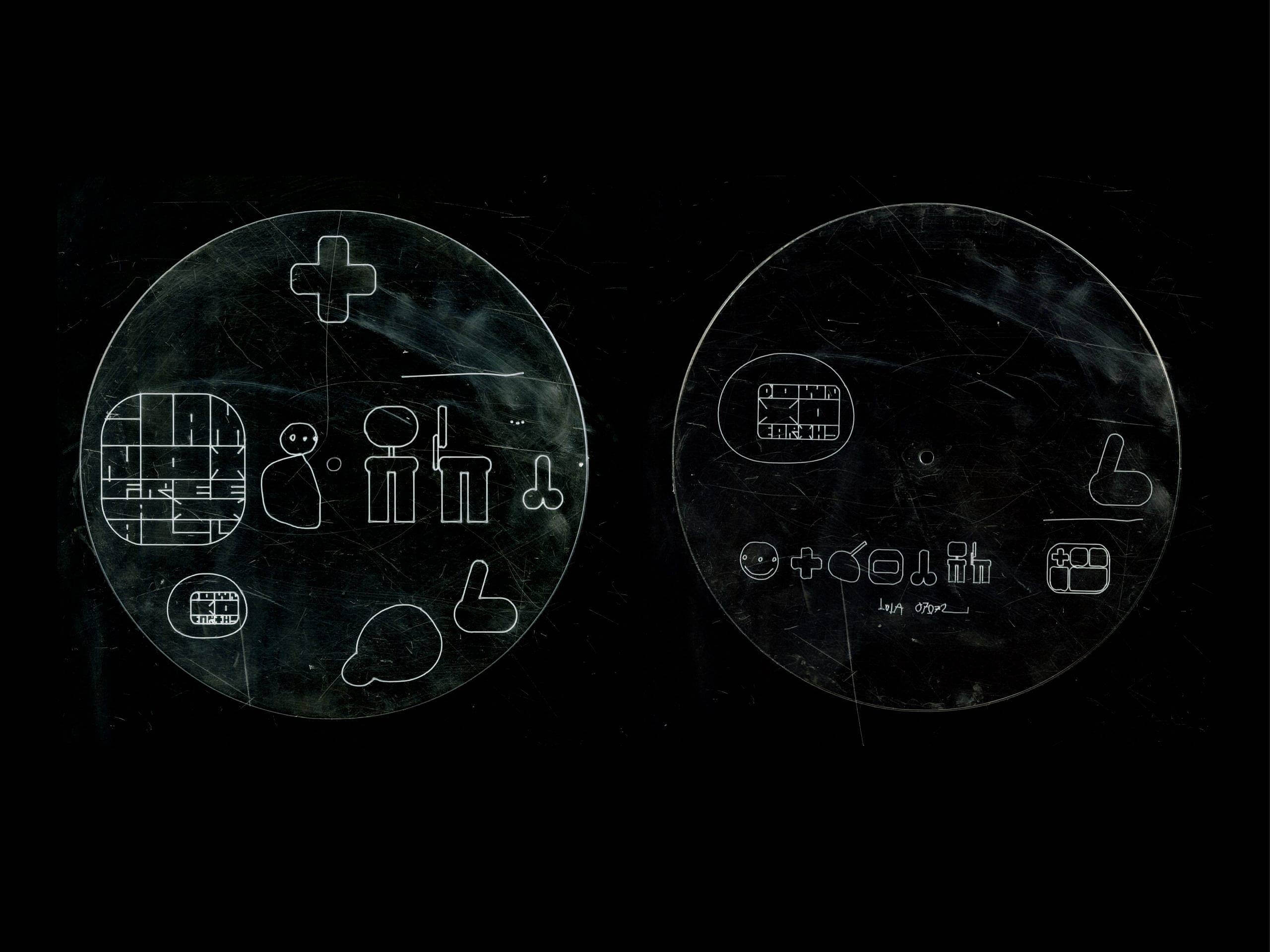 two circles with figures and shapes in them, against a black background